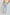 Dalydress men's light blue trousers styled with a beige top and white sneakers