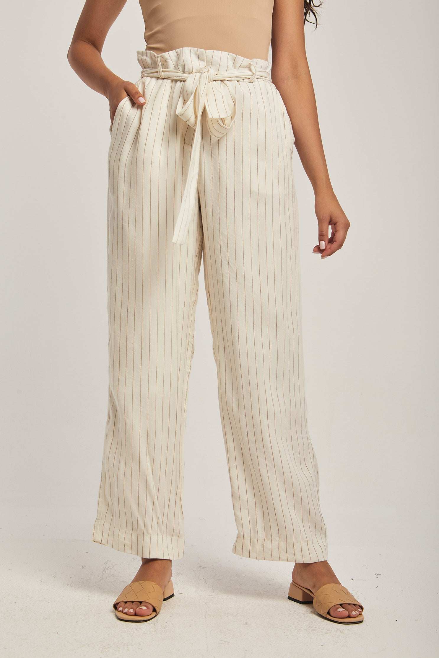 Dalydress women's beige striped high-waisted pants with tie belt, styled for casual wear