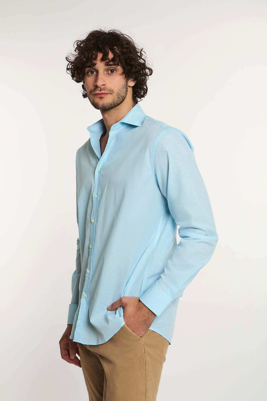 Dalydress men’s casual light blue button-up shirt with beige pants, white background
