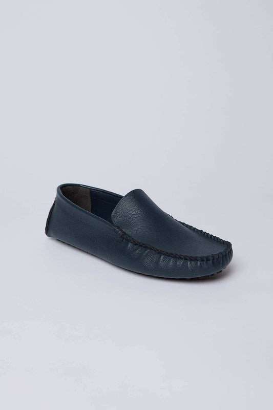 Dalydress men's navy blue leather loafer with moccasin stitching on white background