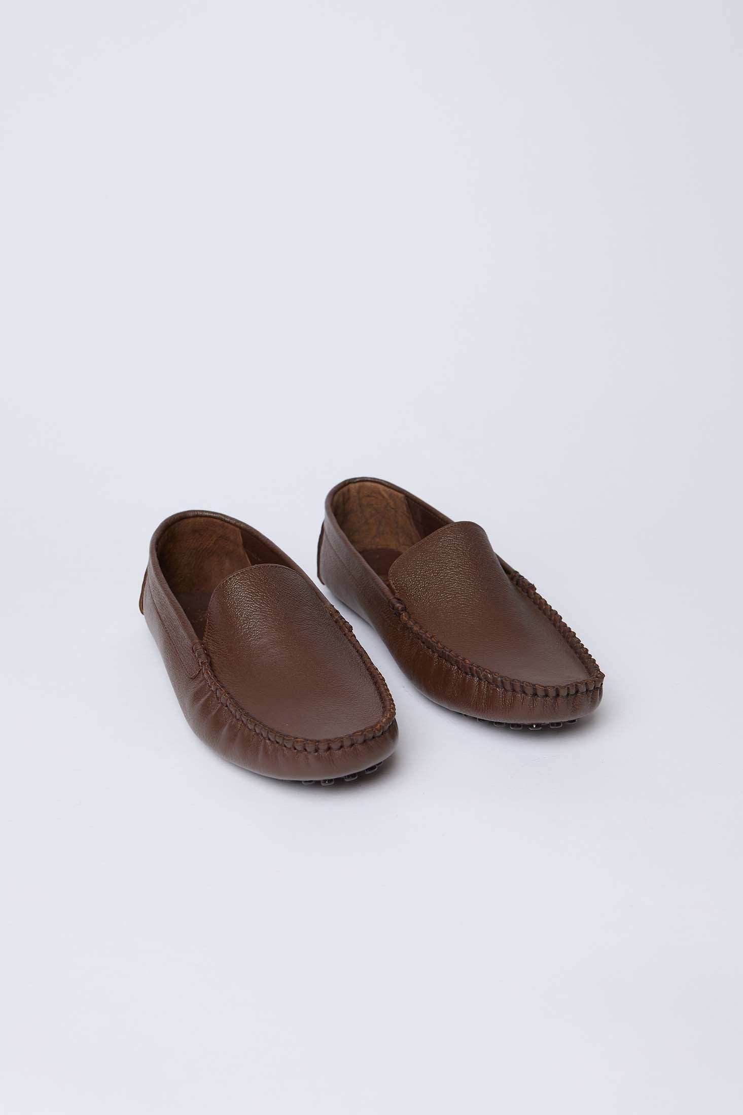 Dalydress men's brown leather loafers with stitched detailing on white background