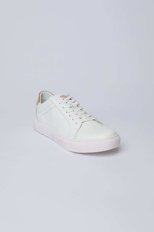 White leather Dalydress sneaker with beige heel detail on clean white background