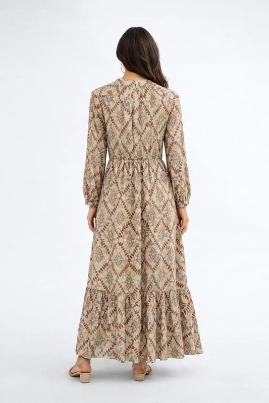 Delicate patterned tiered dress